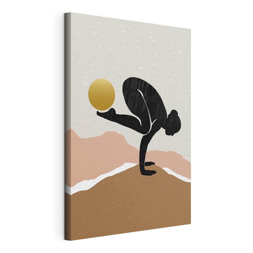 A woman doing a handstand with a yellow ball A woman doing a handstand with a yellow ball