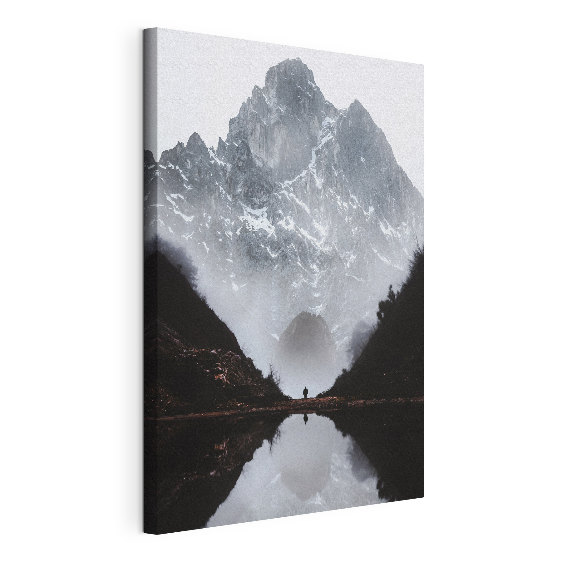 A person standing in a valley with a mountain in the background