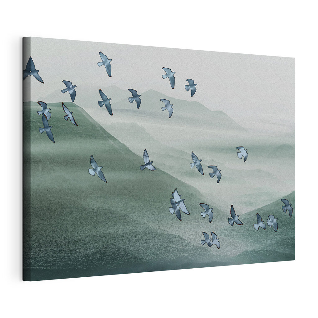 A flock of birds flying over a mountain A flock of birds flying over a mountain