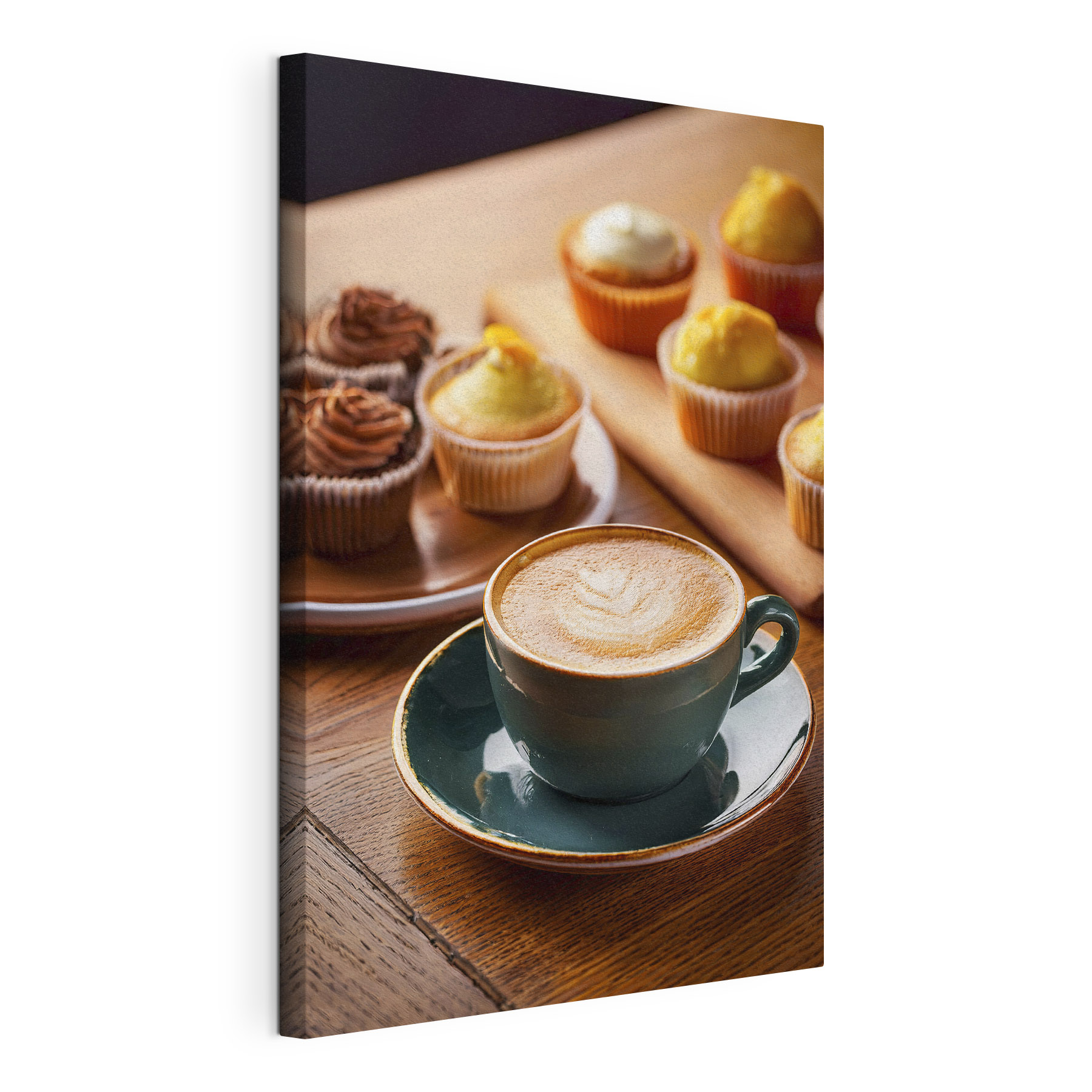 Cup of coffee and cupcakes on a table Cup of coffee and cupcakes on a table