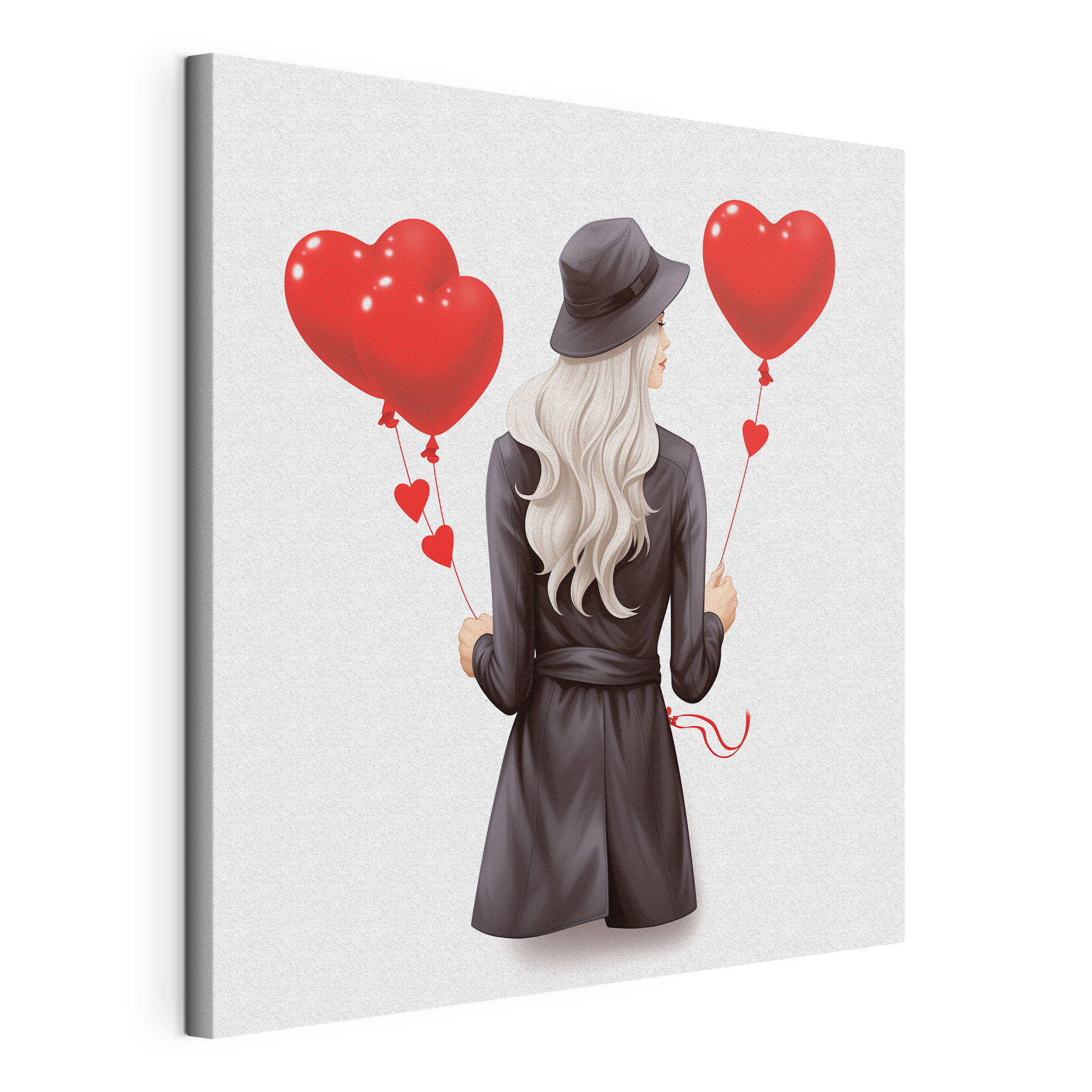 Woman holding a heart shaped balloon Woman holding a heart shaped balloon