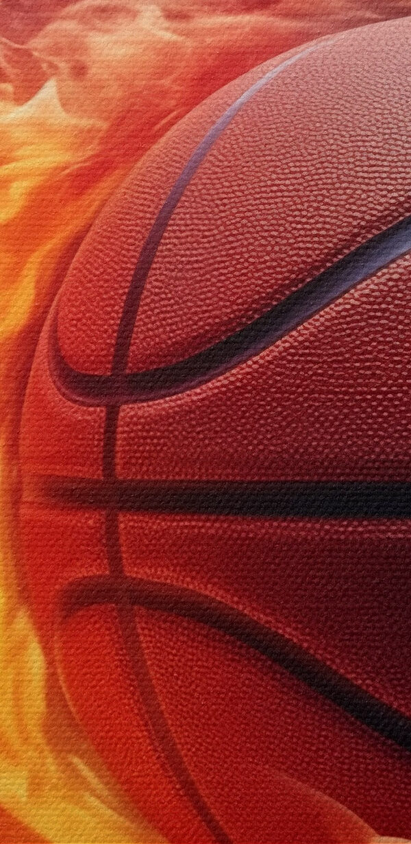 Basketball in flames on a black background Basketball in flames on a black background