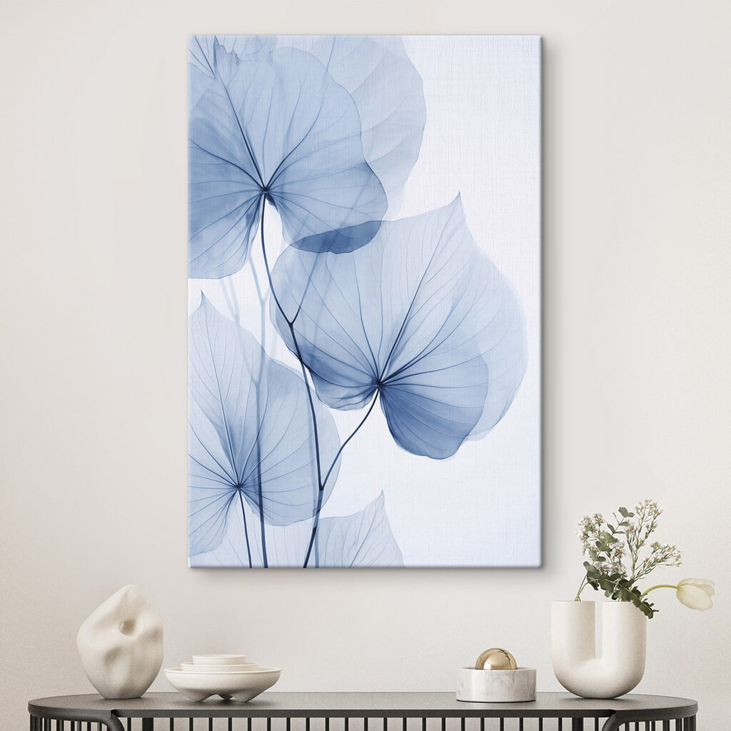Delicate blue leaves on pale background