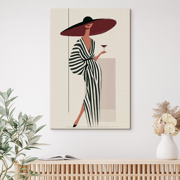 Woman in a striped dress holding a glass of wine