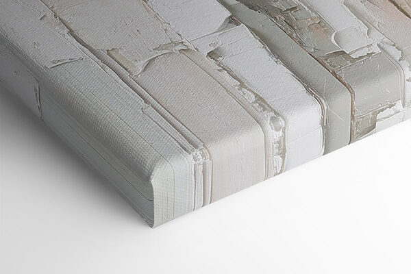 White painted wood with torn pieces of paper