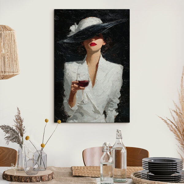 Woman wearing a hat and holding a glass of wine