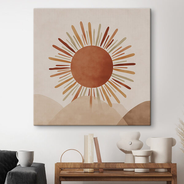 Sun with rays coming out of the top of a hill