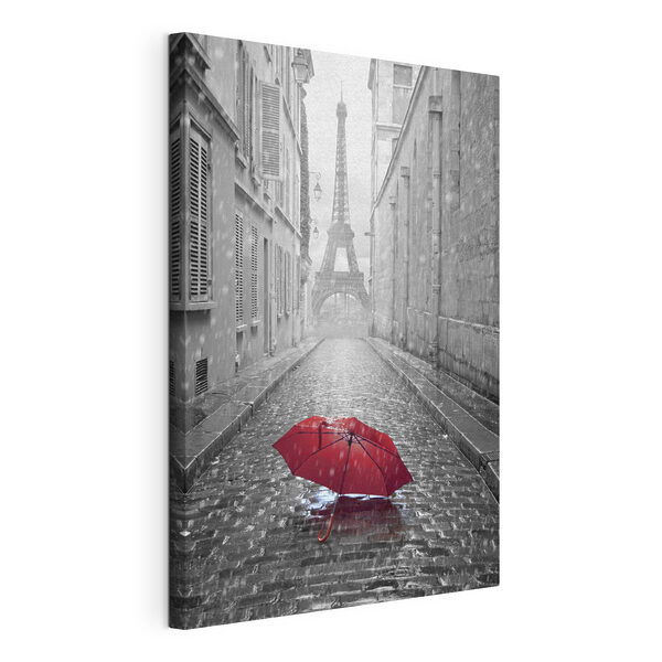 Un ombrello rosso in una strada con una torre sullo sfondo Quadri Un ombrello rosso in una strada con una torre sullo sfondo
