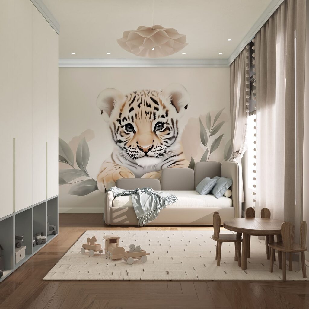 Cucciolo di tigre con delle foglie