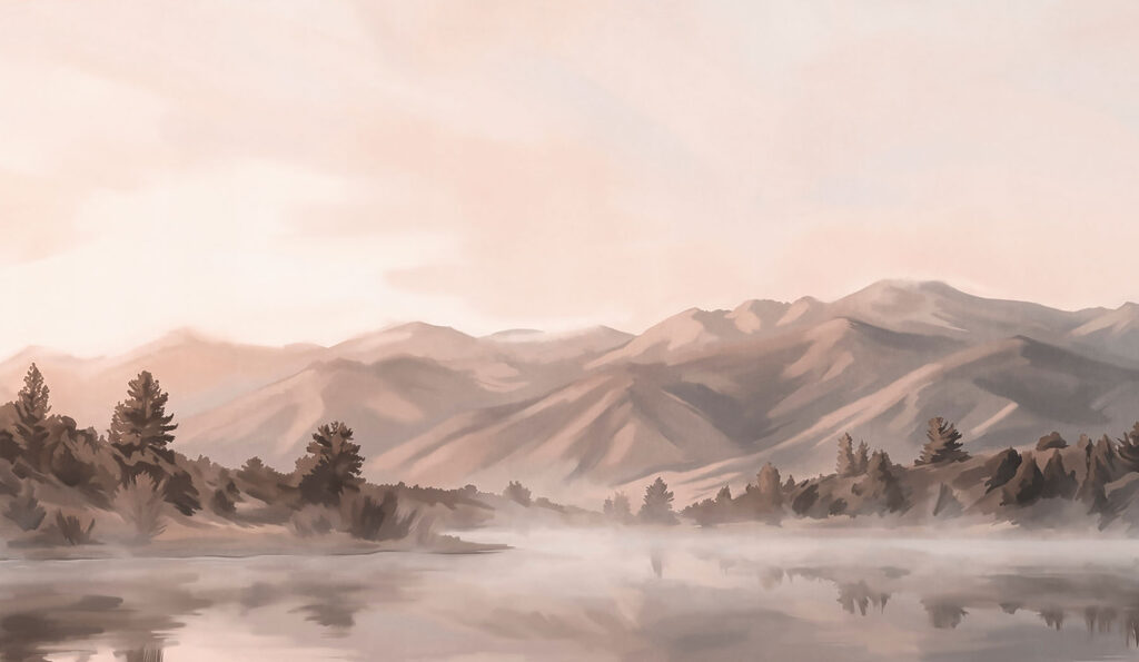 Water body with mountains in the background