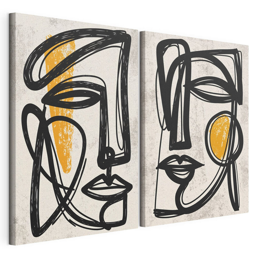 Couple of faces drawn in black and yellow Couple of faces drawn in black and yellow