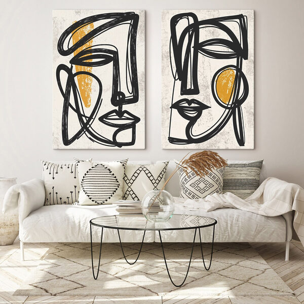 Couple of faces drawn in black and yellow Couple of faces drawn in black and yellow