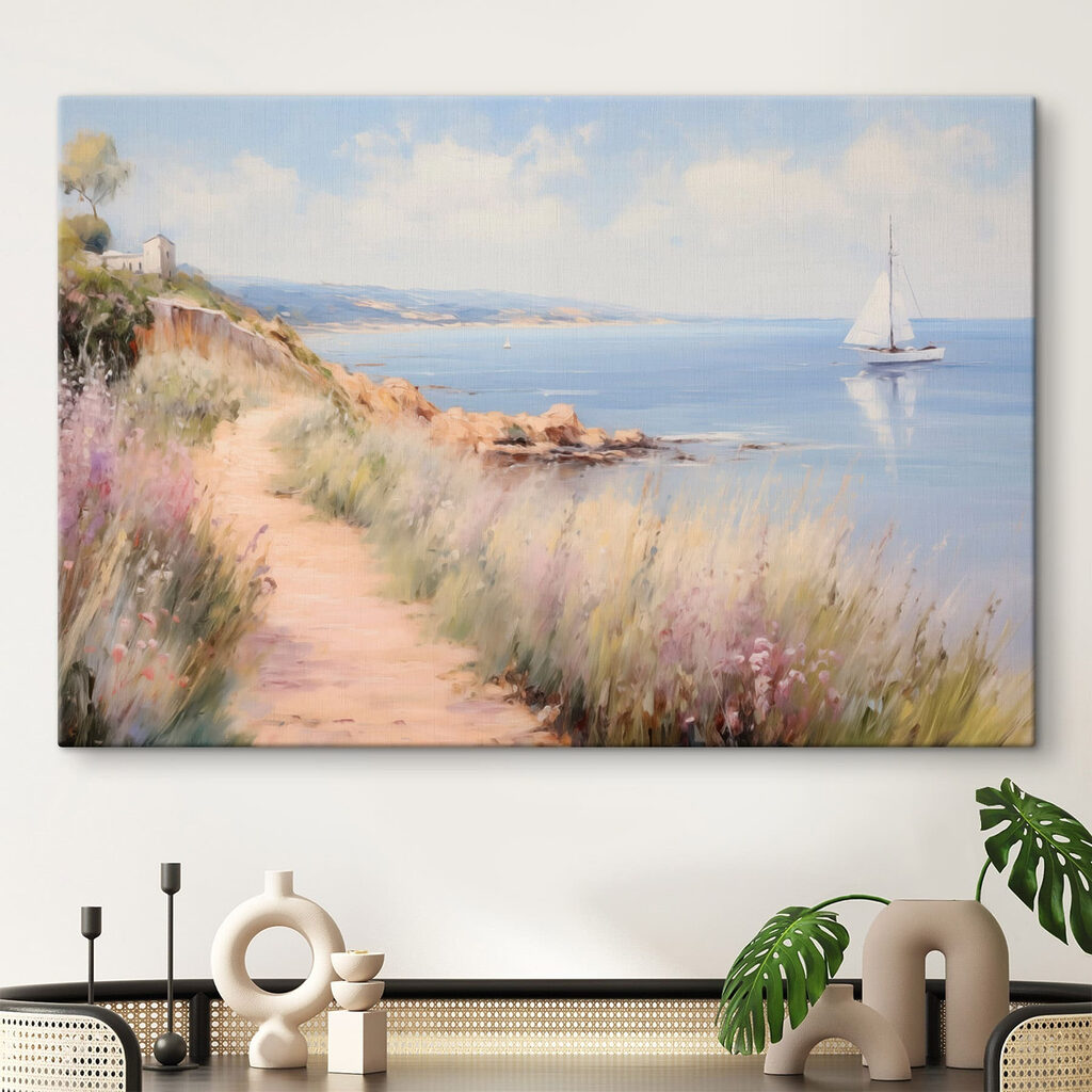 Path leading to a body of water with a sailboat Path leading to a body of water with a sailboat