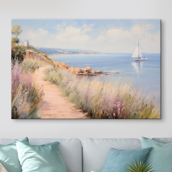 Path leading to a body of water with a sailboat Path leading to a body of water with a sailboat