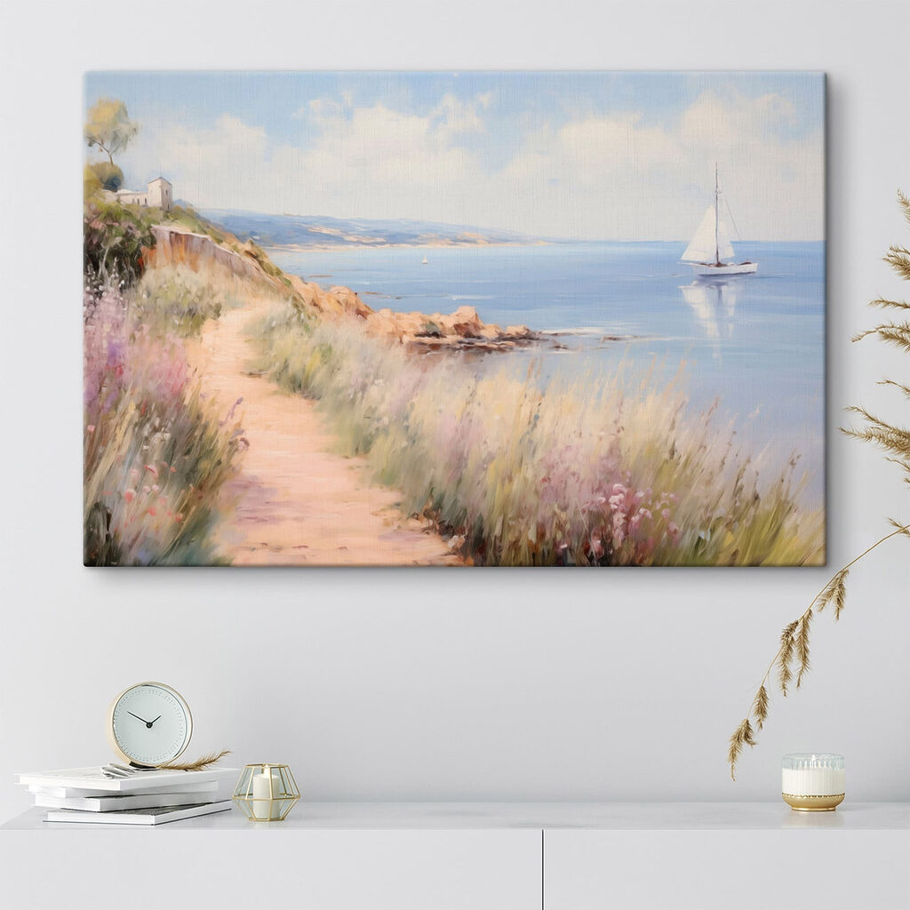 Path leading to a body of water with a sailboat Path leading to a body of water with a sailboat