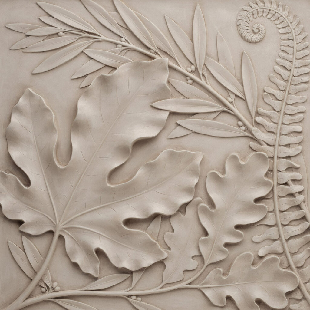 Stone carving of leaves and fern